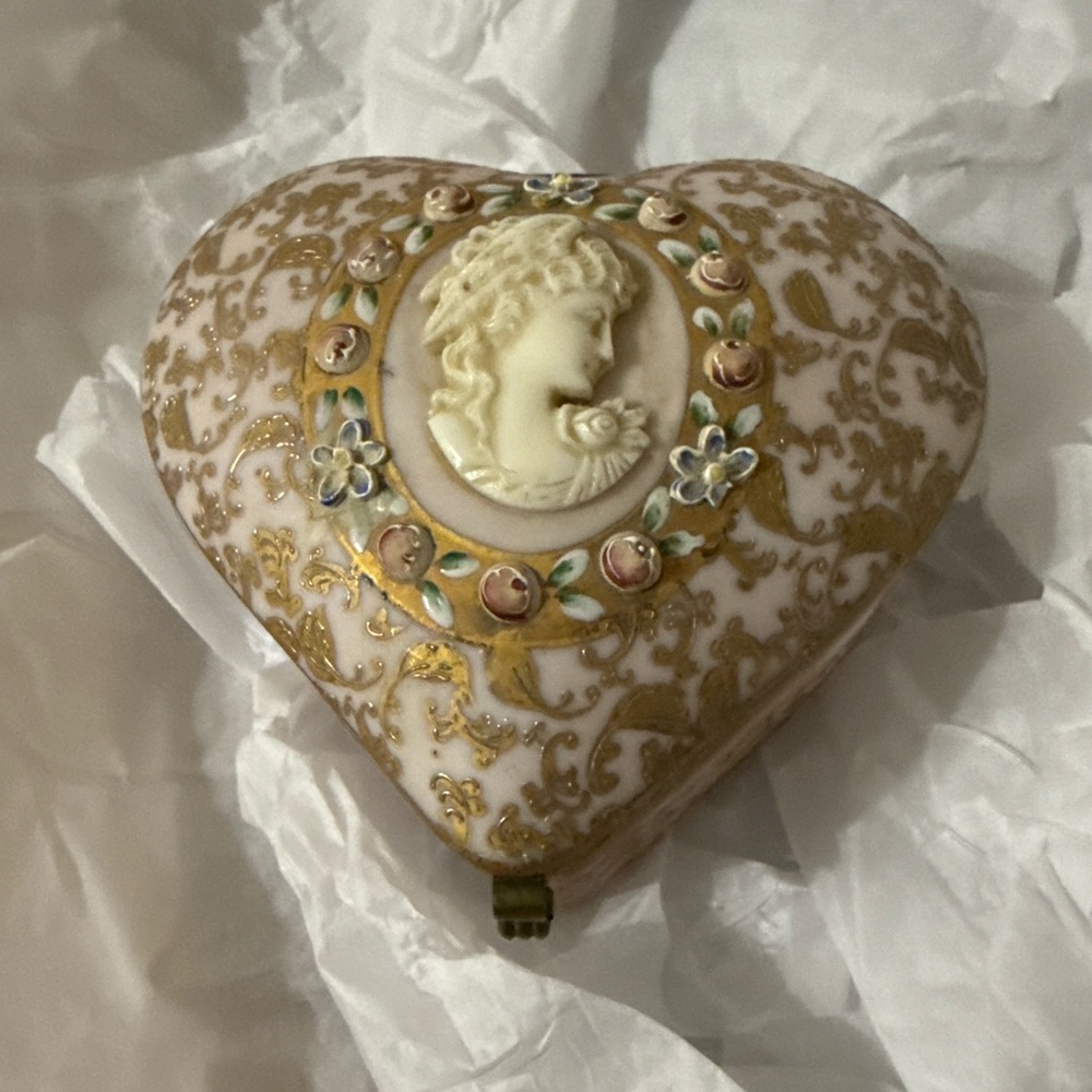 vintage or antique heart-shaped trinket box found in attic of 80 year old home